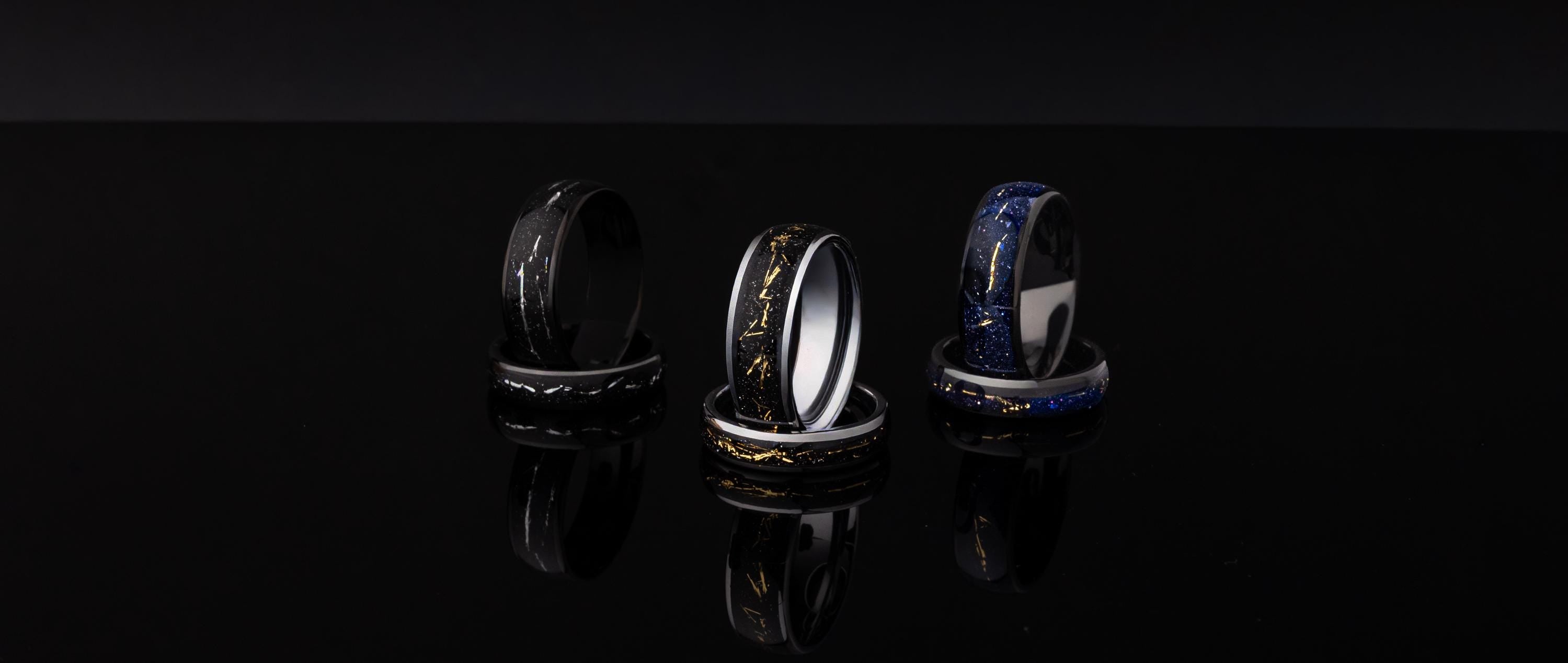 Cosmic Galaxy Rings Wedding Set: Black Sand with Silver Foil