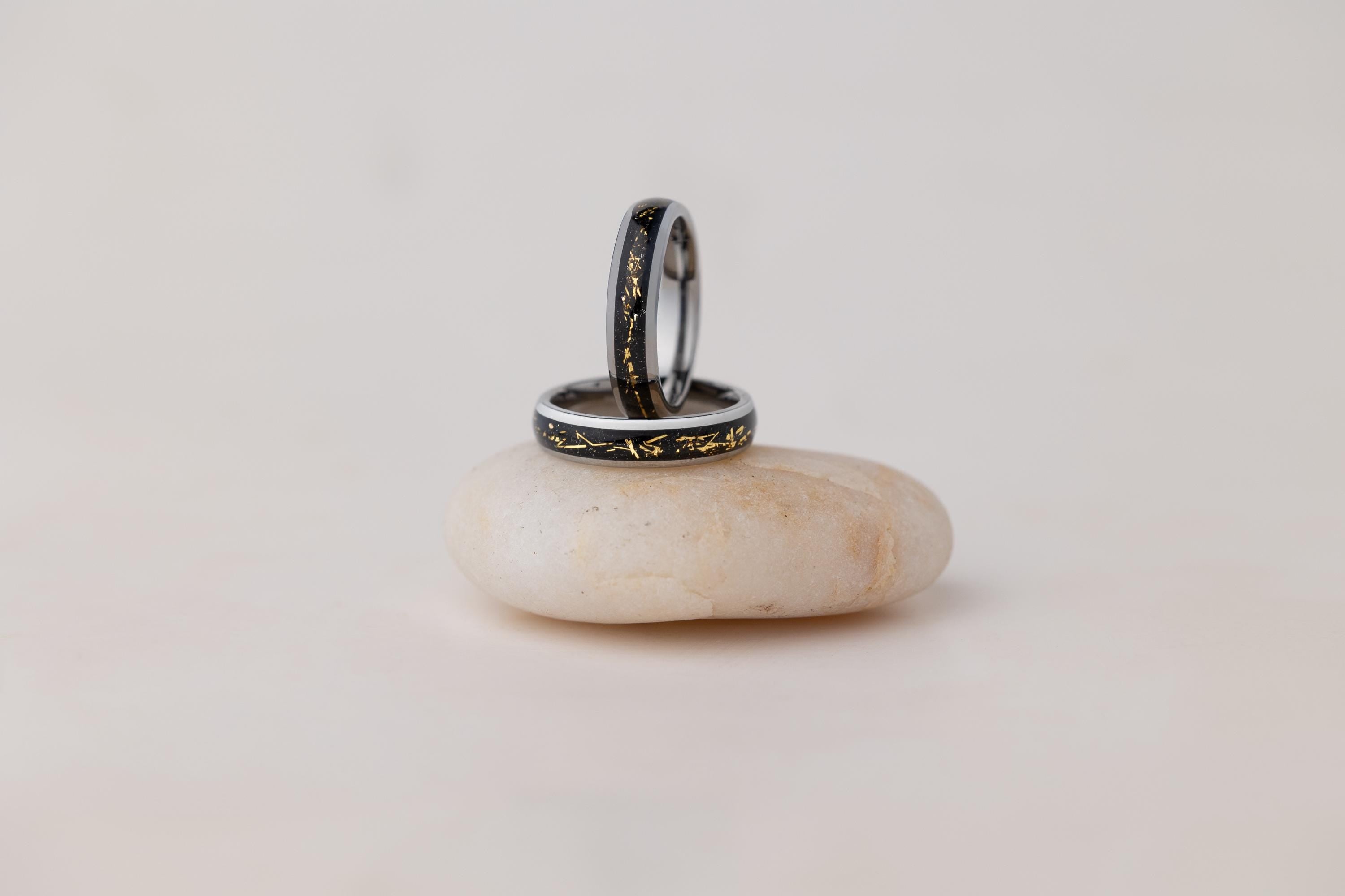 Cosmic Galaxy Rings Wedding Set: Silver Band with Black Sand and Gold Foil