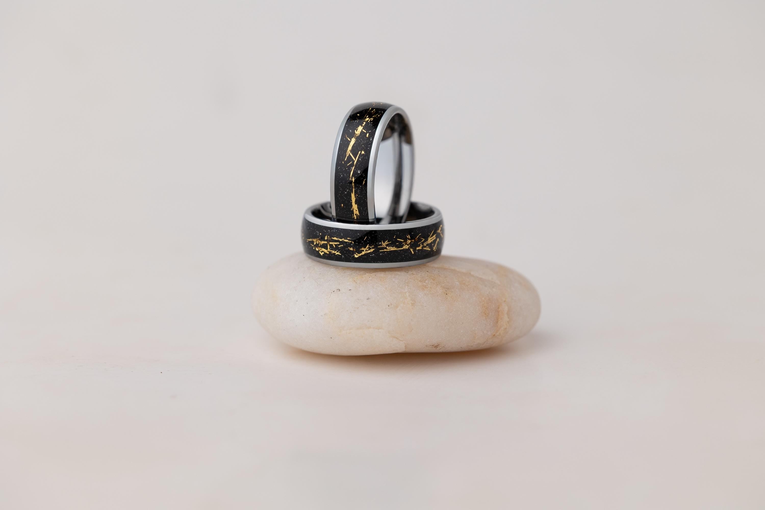 Cosmic Galaxy Rings Wedding Set: Silver Band with Black Sand and Gold Foil