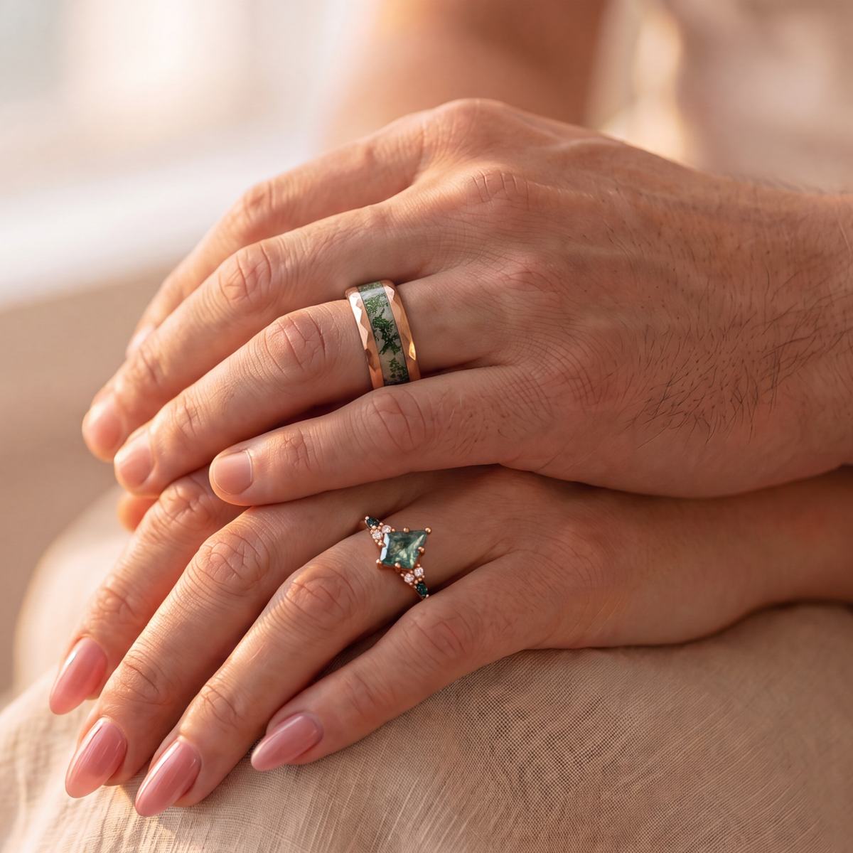 Couple's hands wearing the Evergreen Meadow moss agate matching ring set