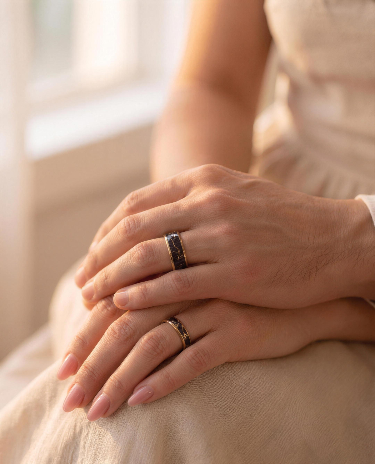 His and hers hands wearing matching Golden Flash rings
