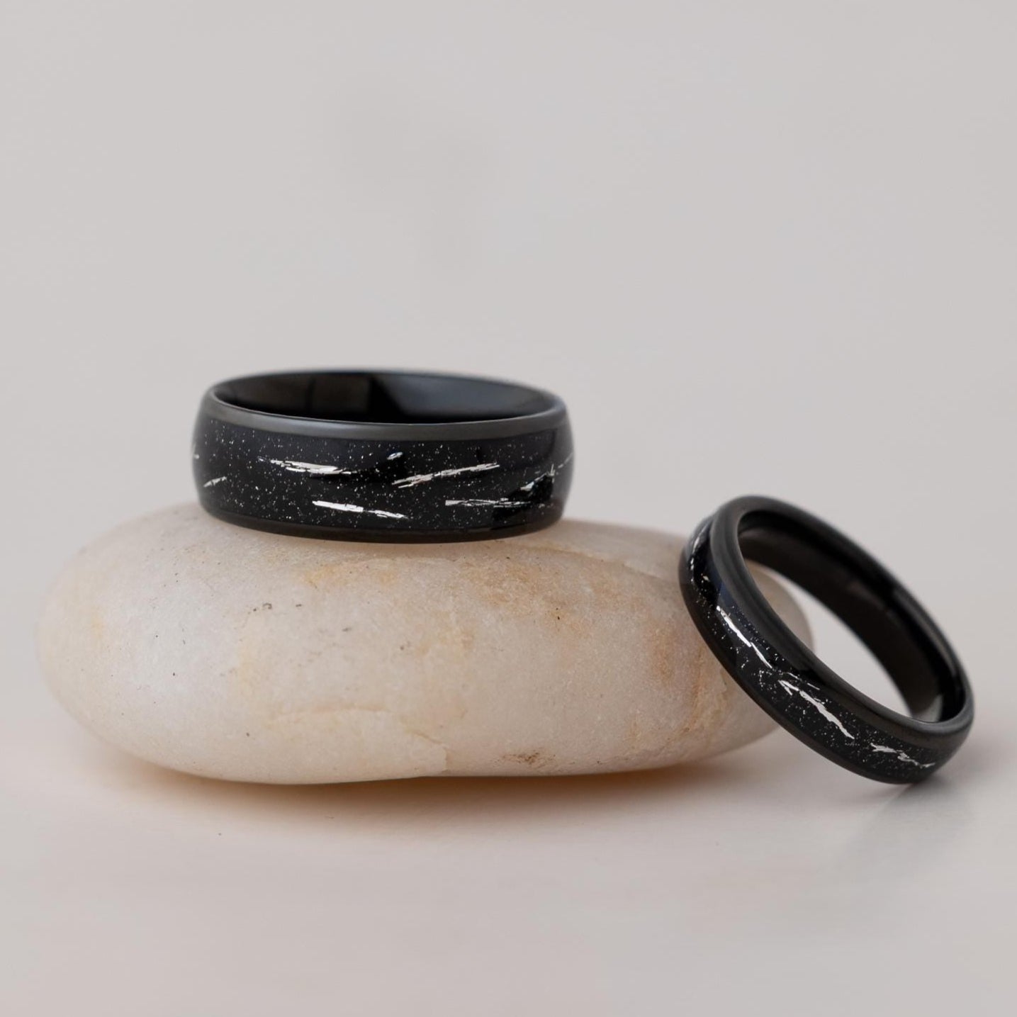 Cosmic Galaxy Rings Wedding Set: Black Sand with Silver Foil